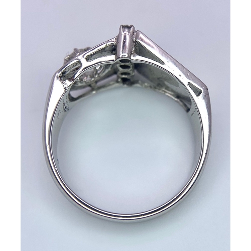 101 - A STERLING SILVER DIAMOND SET RING 0.20CT 5.3G SIZE P 1/2

(7912)