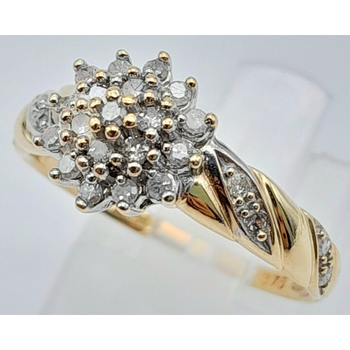 102 - A 9K YELLOW GOLD DIAMOND CLUSTER RING 0.25CT 2G SIZE N

(7532)