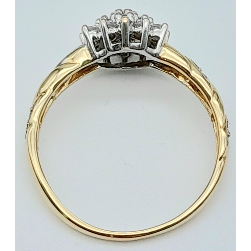 102 - A 9K YELLOW GOLD DIAMOND CLUSTER RING 0.25CT 2G SIZE N

(7532)