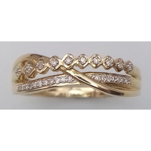 136 - A 9K YELLOW GOLD 2 ROW DIAMOND TWIST CROSS OVER RING. TOTAL WEIGHT 2.4G. SIZE P