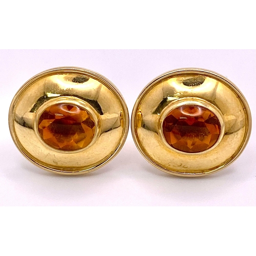 148 - A Designer Pair of Theo Fennell 18K Yellow Gold and Citrine Cufflinks. Cognac coloured rich oval cut... 