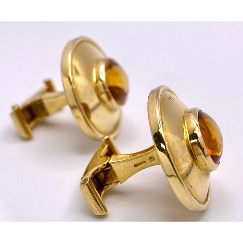 148 - A Designer Pair of Theo Fennell 18K Yellow Gold and Citrine Cufflinks. Cognac coloured rich oval cut... 