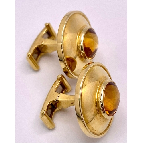 148 - A Designer Pair of Theo Fennell 18K Yellow Gold and Citrine Cufflinks. Cognac coloured rich oval cut... 