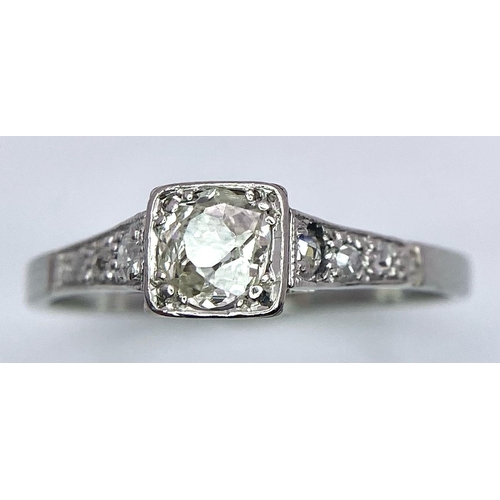 17 - A 18K WHITE GOLD & PLATINUM OLD CUT DIAMOND RING. 0.30CT OLD CUT CENTRE STONE PLUS DIAMOND SHOULDERS... 