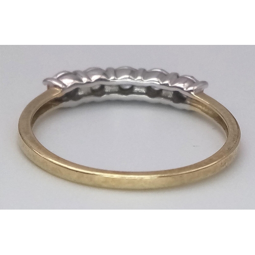 186 - A 9K YELLOW GOLD DIAMOND 5 STONES RING. TOTAL WEIGHT 1.9G. SIZE R