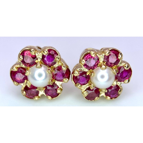 274 - 9k yellow gold red stone and pearl studs, 2.4g.

SH7752H