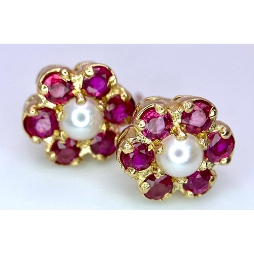 274 - 9k yellow gold red stone and pearl studs, 2.4g.

SH7752H