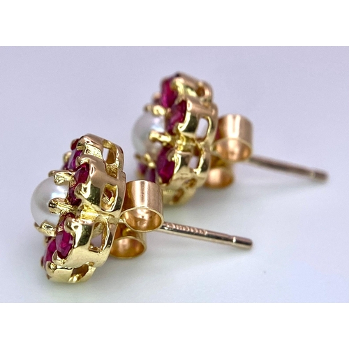 274 - 9k yellow gold red stone and pearl studs, 2.4g.

SH7752H