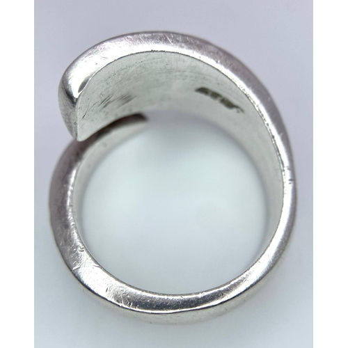 322 - Sterling Silver Fancy Twist Crossover Ring.
Hallmark indicates London and makers mark TS.
Size: Q
We... 