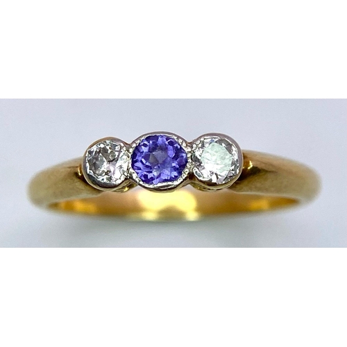 78 - 18k yellow gold diamond and tanzanite trilogy ring.
2.7g, size L.

SH1282I