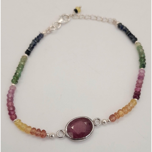 713 - A 60ct Single Strand Necklace with Ruby, Emerald, Sapphire  with 925 Silver clasp and matching Brace... 