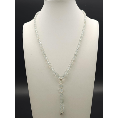 720 - A Single Strand Aquamarine Necklace With Dangler Earrings and A Mystic Topaz Ring all on 925 Silver.... 