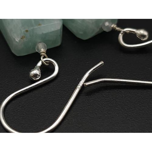 720 - A Single Strand Aquamarine Necklace With Dangler Earrings and A Mystic Topaz Ring all on 925 Silver.... 