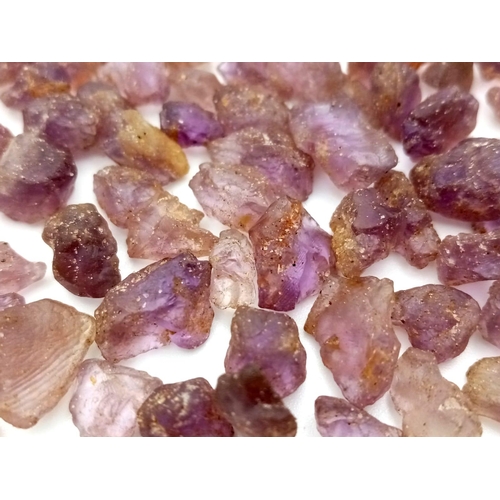 735 - 320.10ct Rough Ametrine Gemstones Lot.
Weight: approx 65.08g