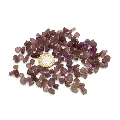 735 - 320.10ct Rough Ametrine Gemstones Lot.
Weight: approx 65.08g