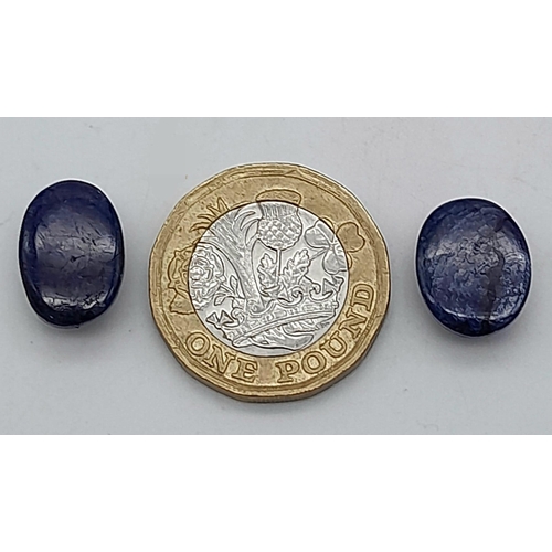 622 - A Pair of 21.30ct Blue Sapphire Gemstone Cabochon. Oval Shapes.