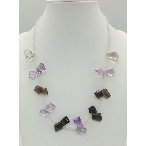 496 - A Collection of 2 Necklaces; An Apatite and Amethyst and A Fancy Multi-gemstones with Moonstone. 44c... 