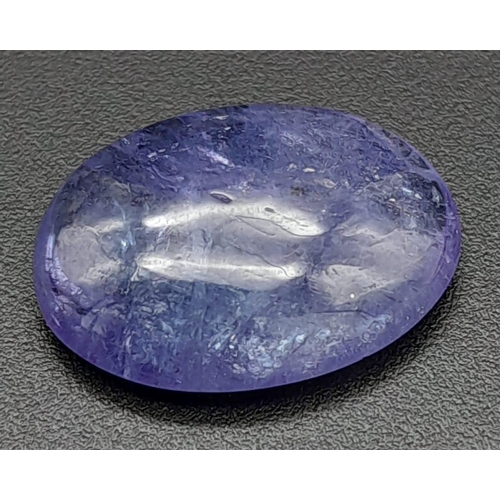 510 - A 8.35 Ct Cabochon Tanzanite in Oval Shape. GLI Certified