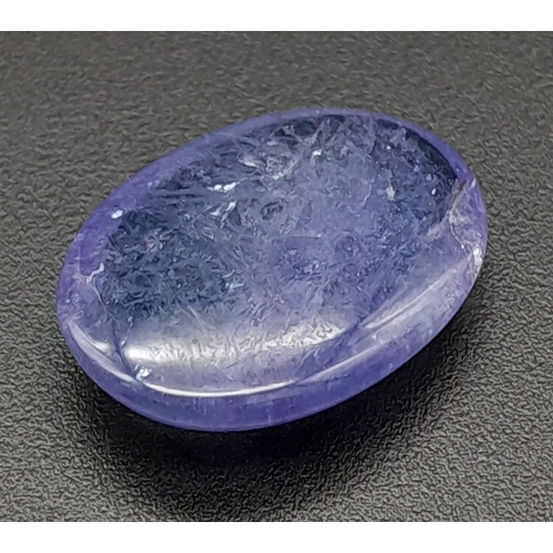 510 - A 8.35 Ct Cabochon Tanzanite in Oval Shape. GLI Certified