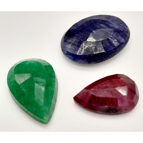 511 - A lot of 41.60 ct Gemstones. A Faceted Ruby, Emerald & Blue Sapphire. Mix Shapes.