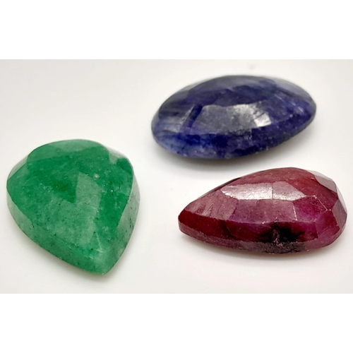 511 - A lot of 41.60 ct Gemstones. A Faceted Ruby, Emerald & Blue Sapphire. Mix Shapes.