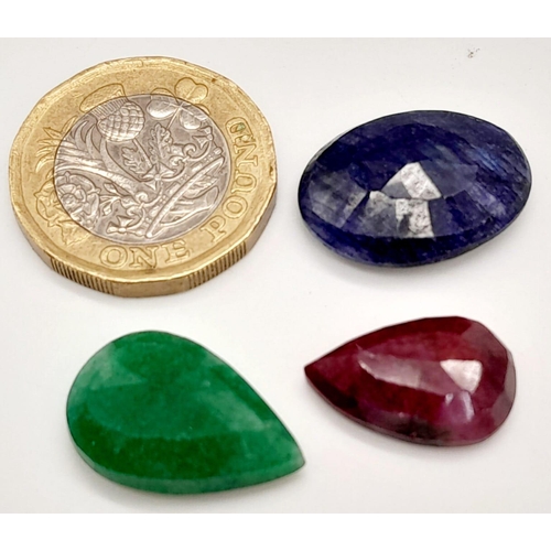 511 - A lot of 41.60 ct Gemstones. A Faceted Ruby, Emerald & Blue Sapphire. Mix Shapes.