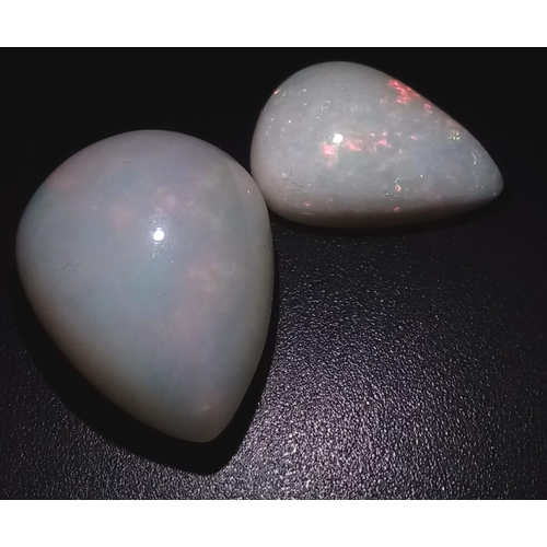 517 - A Lot of 8.80Ct Cabochon Ethiopian White Fire Opal & 3.05 Ct Cabochon White Fire Opal. Pear Shapes. ... 