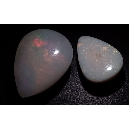 517 - A Lot of 8.80Ct Cabochon Ethiopian White Fire Opal & 3.05 Ct Cabochon White Fire Opal. Pear Shapes. ... 