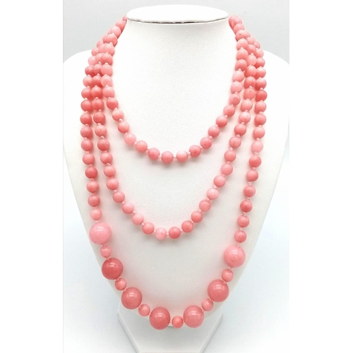 532 - A Rope Length Pink Rhodocrosite Necklace. This 144cm statement piece can be worn in a variety of way... 