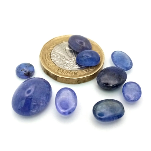 657 - A lot of 24.95Ct Oval Cabochon Tanzanite. Various size.