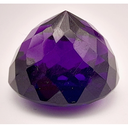 678 - A 36ct Amethyst. Well faceted. Cushion trillion cut. 20mm x 15mm. No certificate so a/f.