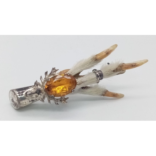 1111 - A 1959 Grouse Claw, Edinburgh hallmarked Silver Brooch.
Lovely stag head, amber colour stone feature... 