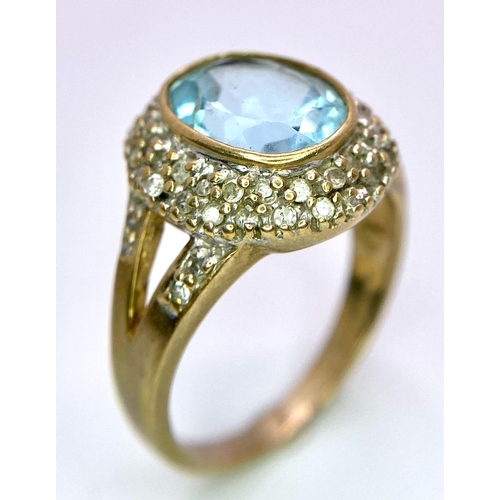 118 - A vintage 9K yellow gold stone set and Aquamarine solitaire ring. Total weight 4.35G. Size M.