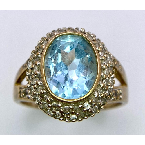 118 - A vintage 9K yellow gold stone set and Aquamarine solitaire ring. Total weight 4.35G. Size M.