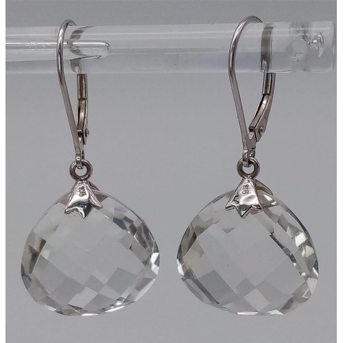 14 - A fancy pair of 9K Gold faceted Quartz earrings. Total weight 6.1G. Please see photos for details.