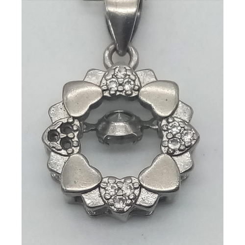 238 - A 925 silver Zirconia round shape pendant on silver chain with 48cm length & a silver ball link neck... 