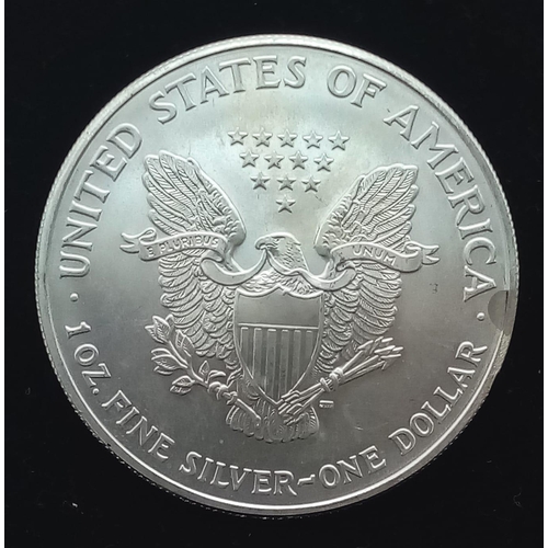 255 - 1 OZ FINE SILVER ONE DOLLAR COIN DATED 2005.
SIZE: 5CM 
WEIGHT: 31.3G