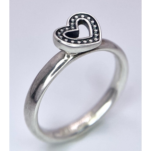 258 - A STERLING SILVER  HEART RING IN THE SPINNING COLLECTION 3.3G SIZE O

(4443)