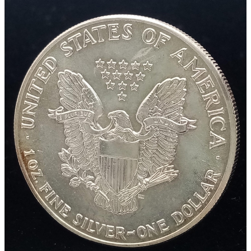 260 - 1 OZ FINE SILVER ONE DOLLAR COIN, DATED 1987.
SIZE: 4.5CM
WEIGHT: 31.3G