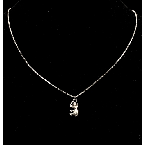 265 - A STERLING SILVER NECKLACE WITH BABY ELEPHANT PENDANT (45cm chain length) & AN ADDITIONAL SILVER SPI... 