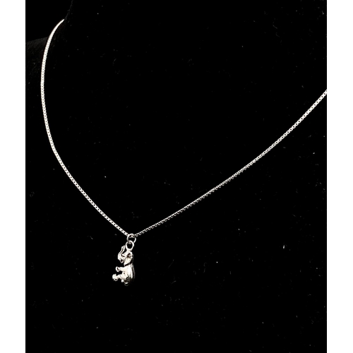 265 - A STERLING SILVER NECKLACE WITH BABY ELEPHANT PENDANT (45cm chain length) & AN ADDITIONAL SILVER SPI... 