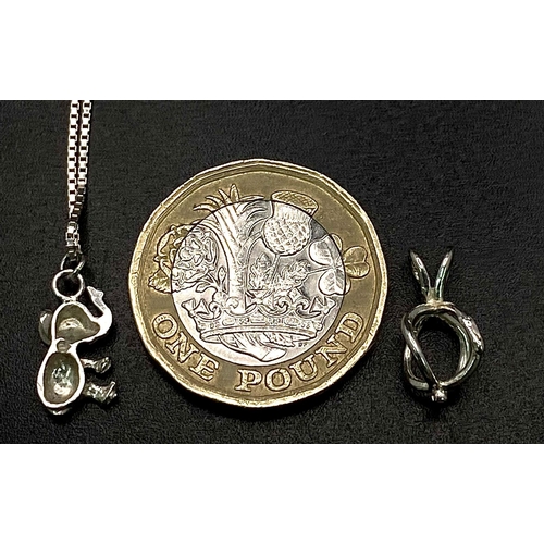 265 - A STERLING SILVER NECKLACE WITH BABY ELEPHANT PENDANT (45cm chain length) & AN ADDITIONAL SILVER SPI... 