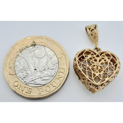 267 - 9k yellow gold filigree heart pendant.
2.5cm wide, 2.7g 

SH3304H