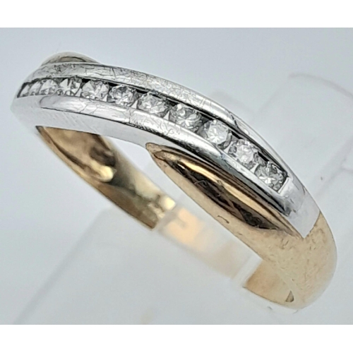 269 - 9k yellow gold diamond set twist ring.
2.4g, size R (dia:0.11ct)

SH2524H