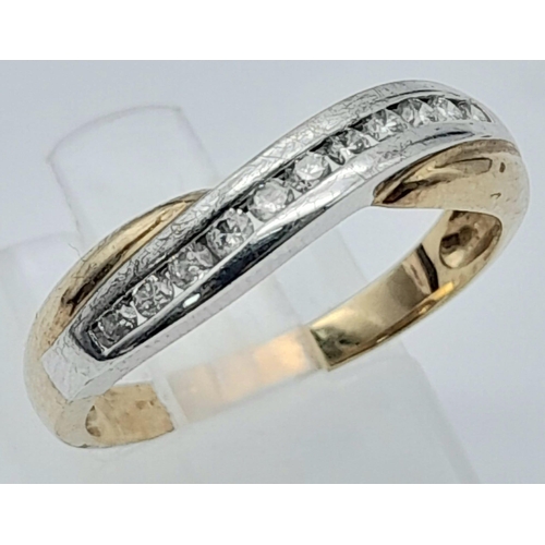 269 - 9k yellow gold diamond set twist ring.
2.4g, size R (dia:0.11ct)

SH2524H