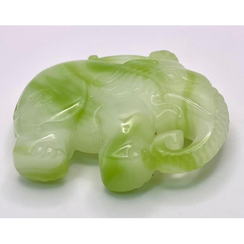 295 - A Chinese Cauliflower Jade Elephant Pendant. 5cm x 4cm