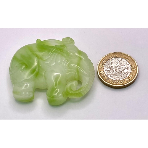 295 - A Chinese Cauliflower Jade Elephant Pendant. 5cm x 4cm