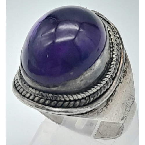 345 - STERLING SILVER, PURPLE STONE SET RING.
SIZE: U
WEIGHT: 9.1G

SC 8051