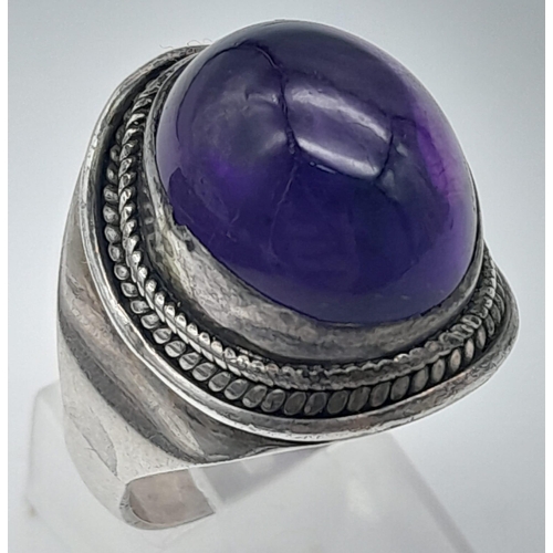 345 - STERLING SILVER, PURPLE STONE SET RING.
SIZE: U
WEIGHT: 9.1G

SC 8051