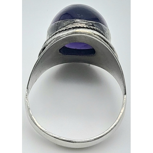 345 - STERLING SILVER, PURPLE STONE SET RING.
SIZE: U
WEIGHT: 9.1G

SC 8051